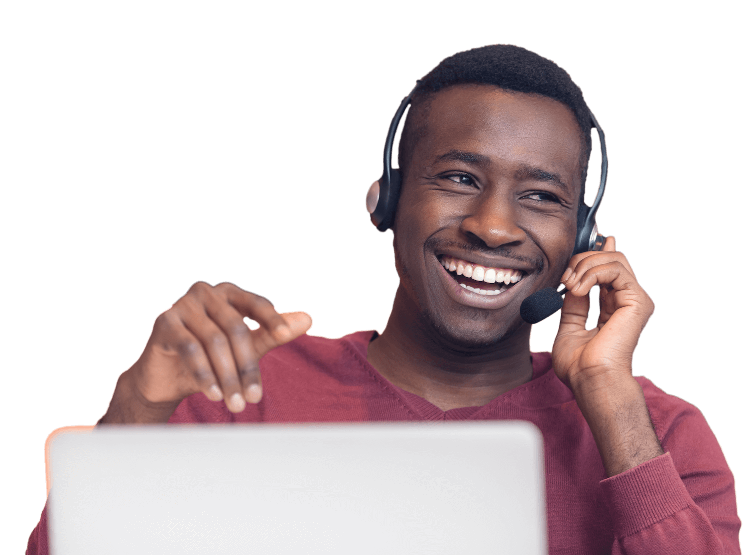 Customer support representative at computer with phone headset